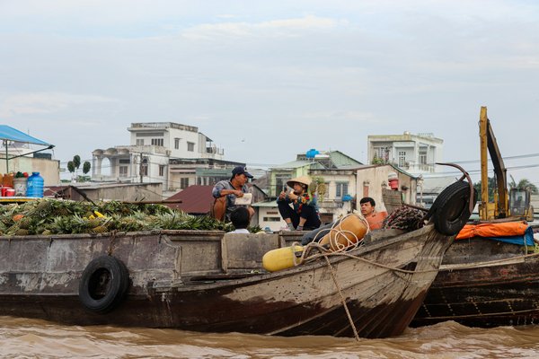 Comment planifier une visite des marchés flottants sur le fleuve Mékong au Vietnam?